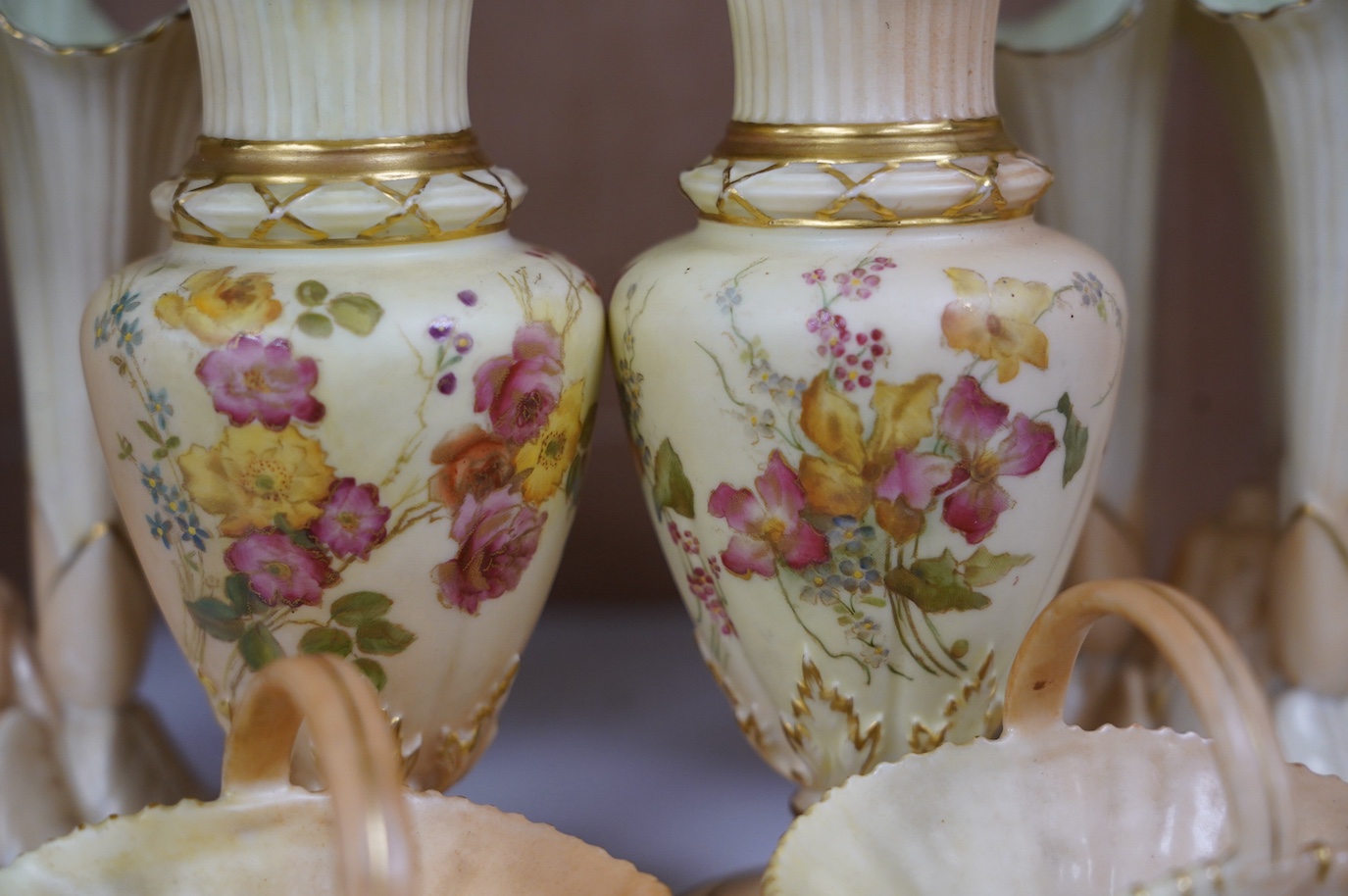 A pair of Worcester vases, shape number 1730, a pair of similar baskets and a pair of Locke & Co. Worcester vases, tallest 16cm. Condition - fair to good, one Locke & Co. vase has a small hairline crack, wear to gilding